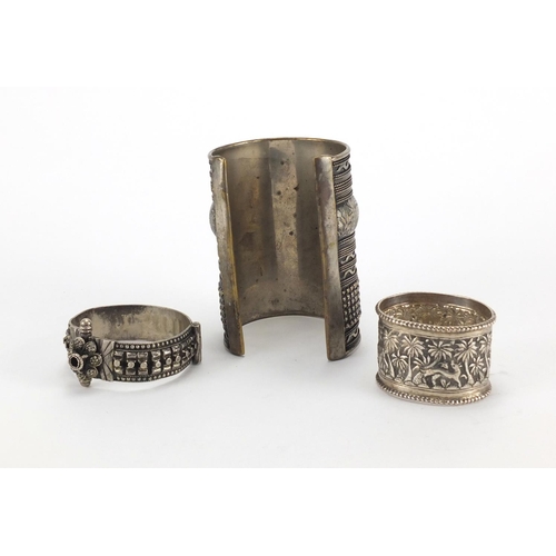 354 - Middle Eastern silver coloured metal cuff, bangle and napkin ring