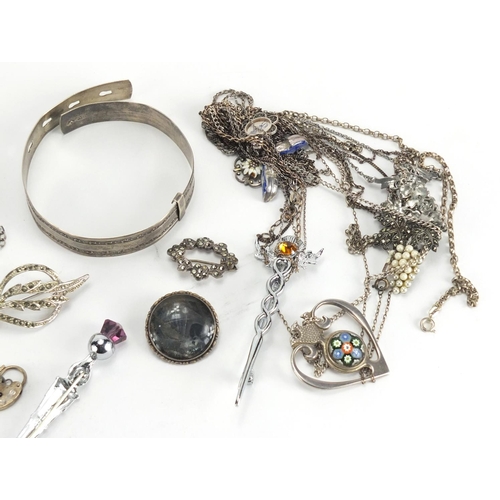 348 - Silver and white metal jewellery including a Siam buckle, bracelets, Marcasite grapevine necklace an... 