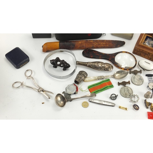 564 - Box of objects including a vintage camera, silver plated items, olivewood book and coins