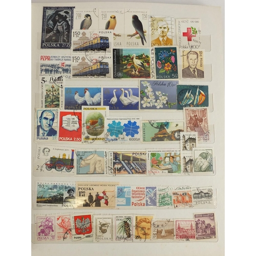 696 - World stamps arranged in an album including Olympic examples