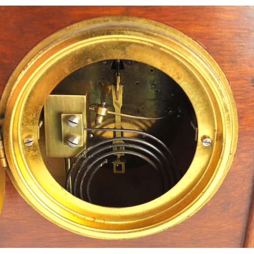 180 - Two mahogany cased striking mantel clocks