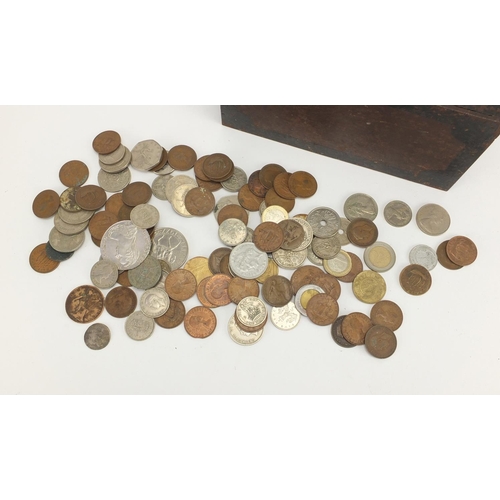 638 - Large selection of mostly British pre decimal coins and Commemorative crowns, with a cast iron fire ... 