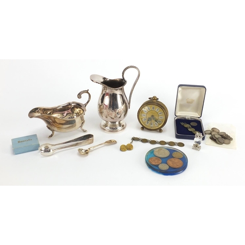 543 - Bag of object including silver three penny bits, Marksman alarm clock and silver plated items