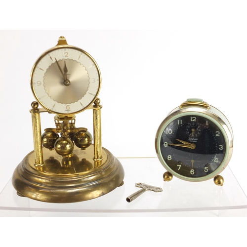 456 - Vintage and later clocks including a Junghans Trivox and a set of postage scales