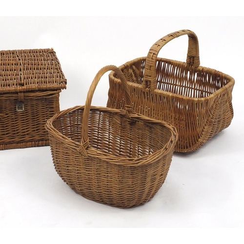 613 - Three vintage wicker baskets and a hamper