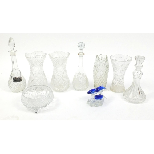 570 - Cut glassware including decanters and a pair of vases, 28cm high