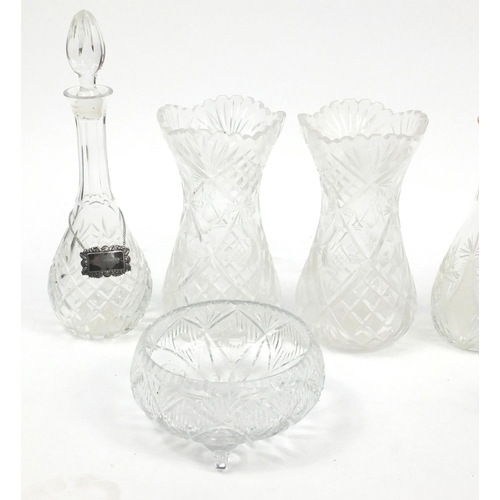 570 - Cut glassware including decanters and a pair of vases, 28cm high