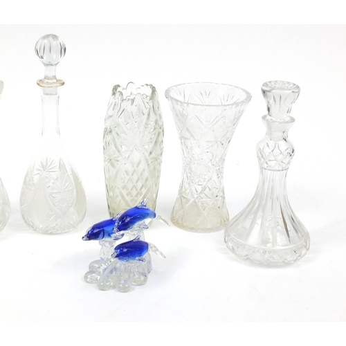 570 - Cut glassware including decanters and a pair of vases, 28cm high