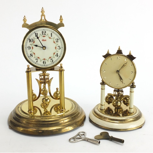 223 - Two brass Anniversary clocks including a Kundo example