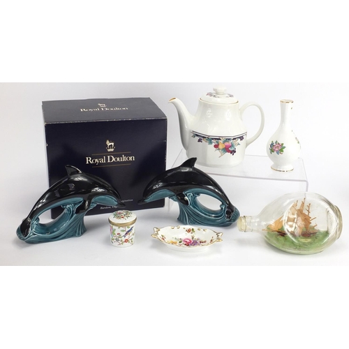 522 - Collectable china including a pair of Poole dolphins, a boxed Royal Doulton teapot and a ship in a b... 