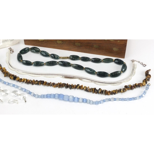 386 - Group of polished stone necklaces including Tigers Eye and semi precious stones