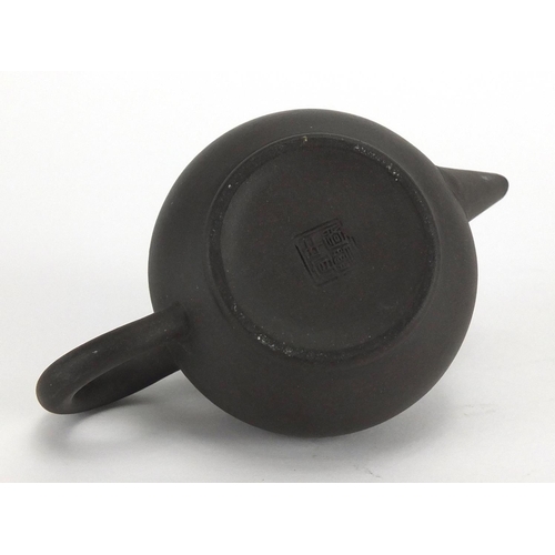 654 - Miniature Oriental terracotta teapot, 8.5cm in length