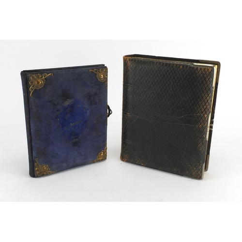 727 - Two Victorian photograph albums, with a selection of photographs and cabinet cards