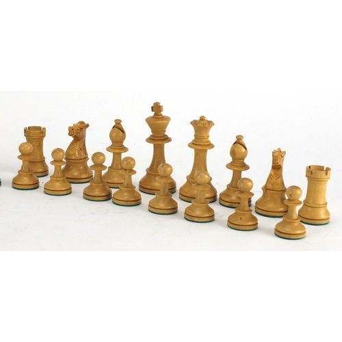 651 - Turned wooden chess set with weighted bases, the largest piece, 8cm high