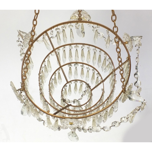 176 - Brass four tier chandelier with glass drops, 82cm high x 28cm in diameter