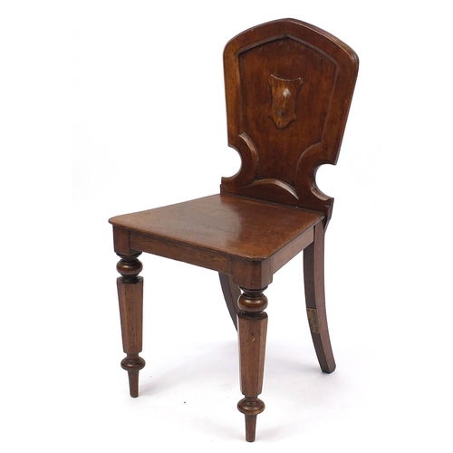 43 - Victorian oak shield back hall chair, 85cm high
