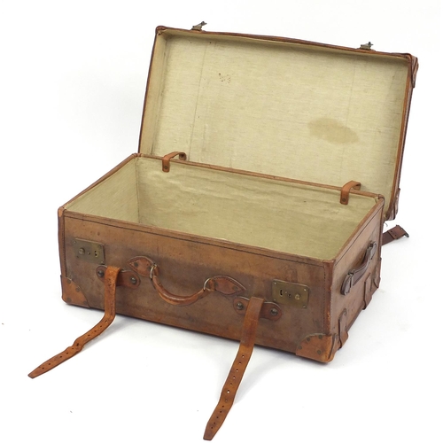 52 - Vintage leather suitcase with brass locks, 76cm wide