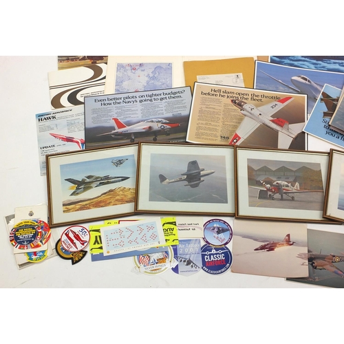 783 - Group of aviation ephemera including prints of Military planes, cloth badges and Nevada Air National... 