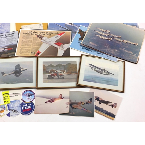 783 - Group of aviation ephemera including prints of Military planes, cloth badges and Nevada Air National... 