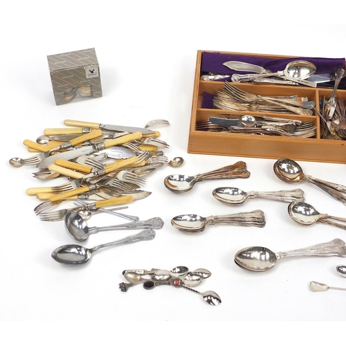 313 - Mostly silver plated cutlery including some with silver finials and ivorine handles