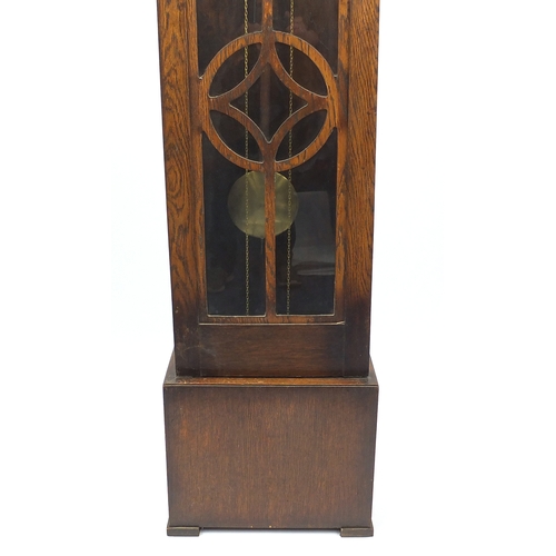 2050 - Art Deco oak cased Grandmother clock, the silvered dial with Arabic numerals, 188cm high