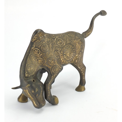 245 - Stylish glass bull engraved with flower heads, 40cm wide