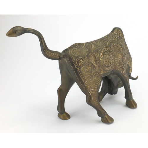 245 - Stylish glass bull engraved with flower heads, 40cm wide