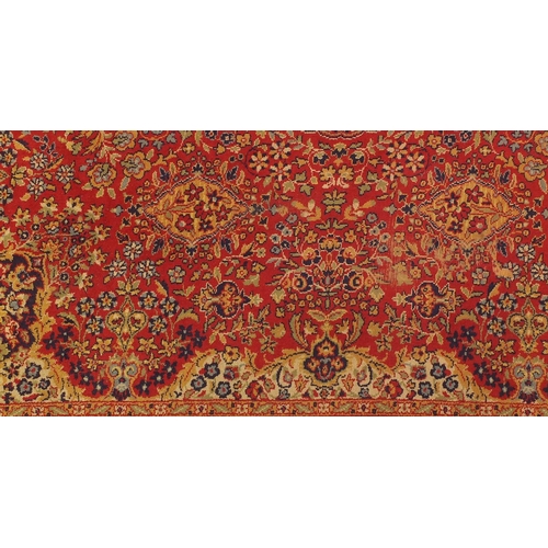 108 - Rectangular persian rug, the central field and corresponding borders having all over floral motifs p... 