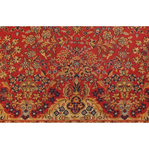 108 - Rectangular persian rug, the central field and corresponding borders having all over floral motifs p... 