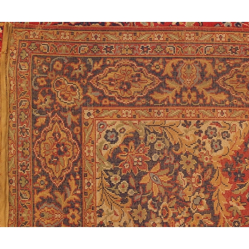 108 - Rectangular persian rug, the central field and corresponding borders having all over floral motifs p... 