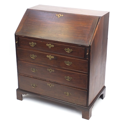 2061 - Georgian walnut bureau, the fall enclosing a fitted interior above four graduated drawers, raised on... 