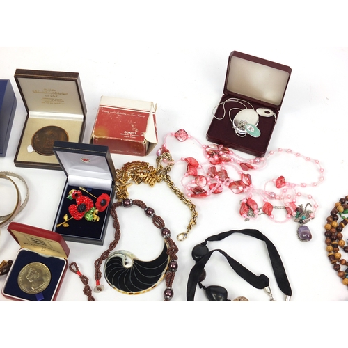 411 - Box of assorted costume jewellery including necklaces, as new wristwatches and bracelets, with a sel... 