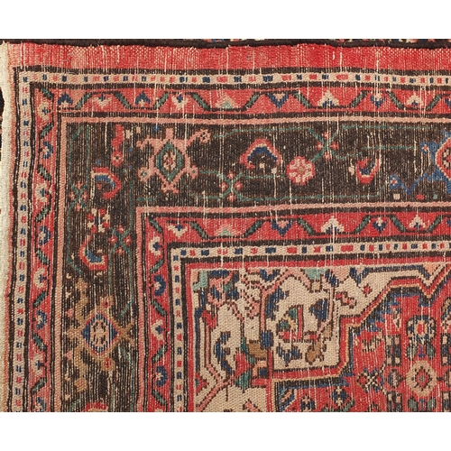 2041 - Rectangular Persian Hamadan carpet having an all over geometric floral design, 319cm x 216cm