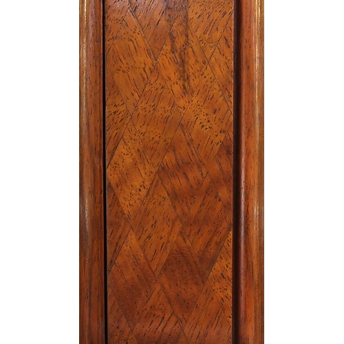 2001 - Good French walnut parquetry armoire with carved crest and pineapple finials, the bevelled mirrored ... 