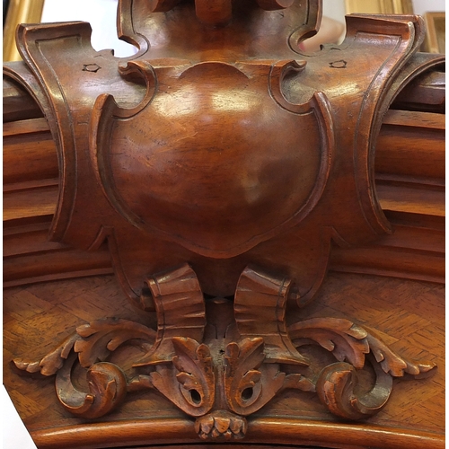 2001 - Good French walnut parquetry armoire with carved crest and pineapple finials, the bevelled mirrored ... 