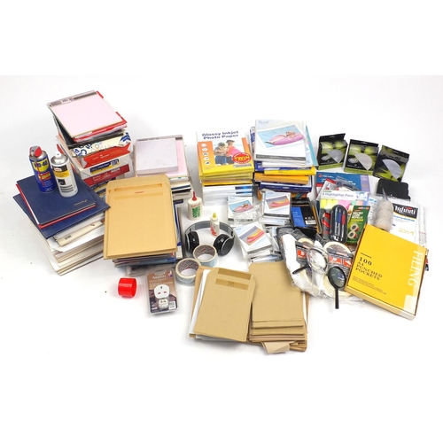 626 - Large selection of stationery including paper, photographic paper, guillotine, cello tape and pens