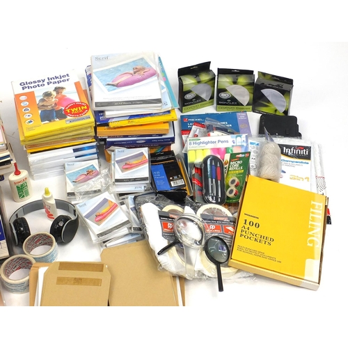 626 - Large selection of stationery including paper, photographic paper, guillotine, cello tape and pens