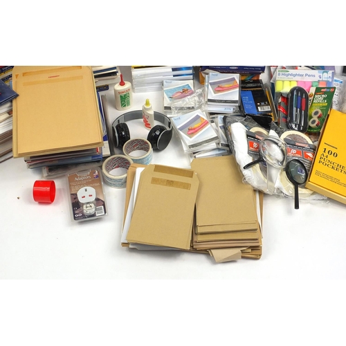 626 - Large selection of stationery including paper, photographic paper, guillotine, cello tape and pens