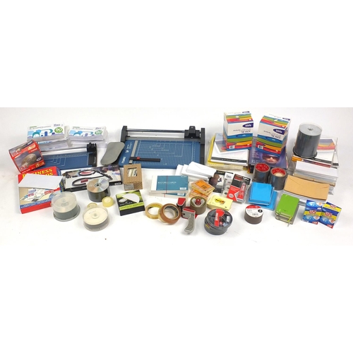 626 - Large selection of stationery including paper, photographic paper, guillotine, cello tape and pens