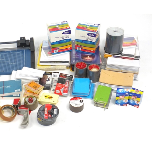 626 - Large selection of stationery including paper, photographic paper, guillotine, cello tape and pens