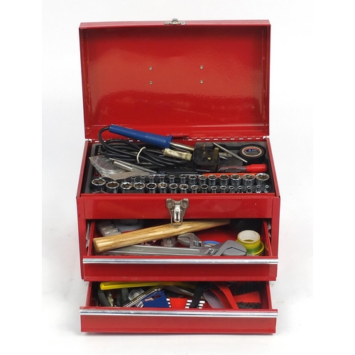 569 - Red metal tool box with socket set and tools