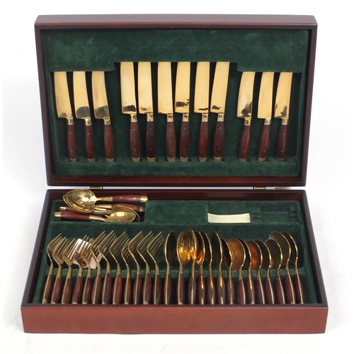 582 - Mahogany canteen of bronze cutlery