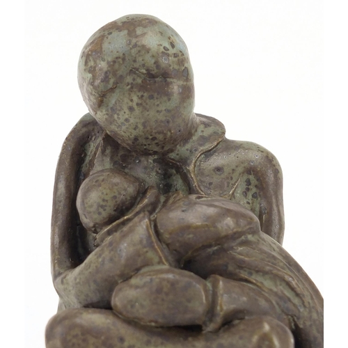 225 - Modernist studio pottery sculpture of mother holding a child, 17.5cm high