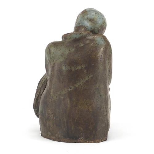 225 - Modernist studio pottery sculpture of mother holding a child, 17.5cm high