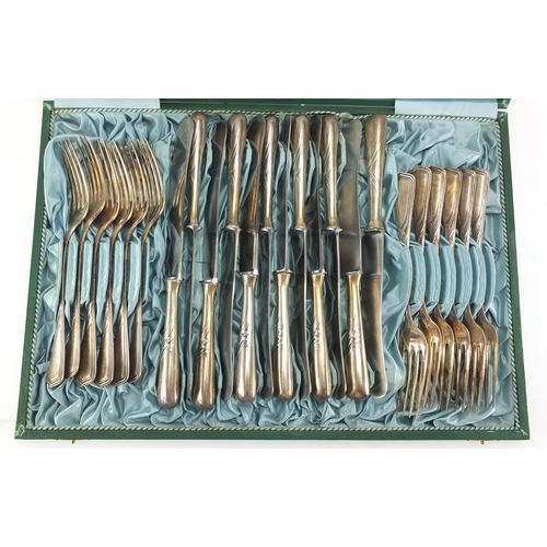 277 - Set of twelve German silver plated knives and forks, all impressed 30, housed in a fitted Mook & Shc... 