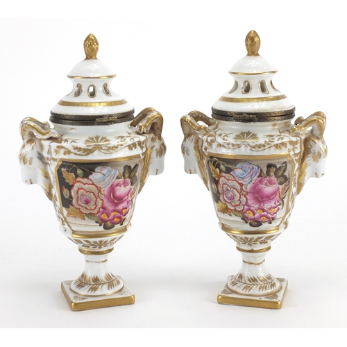 443 - Pair of Meissen style porcelain urn vases and covers, with rams head handles, both hand painted with... 