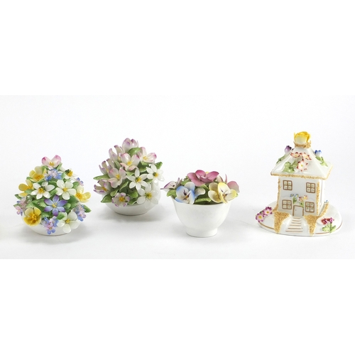 449A - Three Coalport pastille burners and five Royal Doulton and Coalport flowers, the largest 11cm high