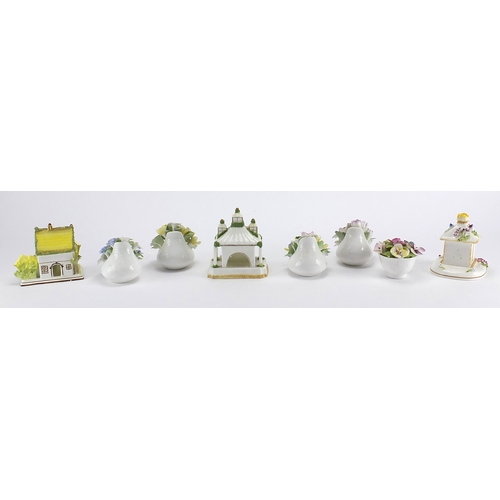 449A - Three Coalport pastille burners and five Royal Doulton and Coalport flowers, the largest 11cm high