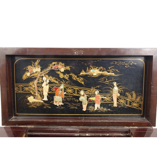 89 - Oriental hardwood and black lacquered cocktail cabinet, decorated in relief with figures, 88cm H x 7... 