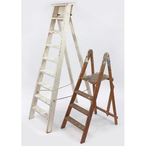 129 - Two sets of vintage folding wooden step ladders